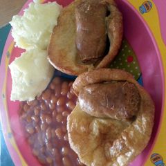 Tiddly Puds (toad in the hole) A picture of Tiddly Puds (toad in the hole).