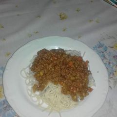 A picture of Mince and vegetable curry in tin.