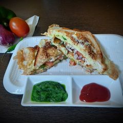 A picture of Egg cheese omelette sandwich.