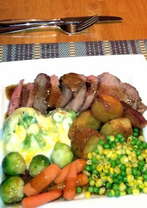 A picture of Roast lamb with Rosemary and Garlic.