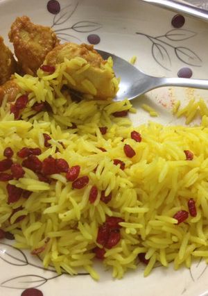 A picture of Iranian Rice With Saffron And Dried Pomegranate.