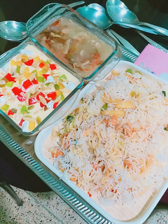 A picture of Chicken chilli with fried rice.