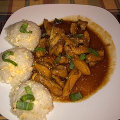 A picture of Teriyaki Chicken and egg fried rice.
