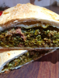Una foto de Calzone del Tata