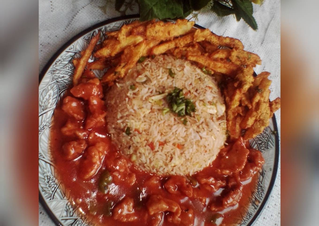 Chicken Manchurian with Egg Fried Veggies Rice & Crispy fries