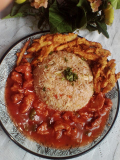 A picture of Chicken Manchurian with Egg Fried Veggies Rice & Crispy fries.