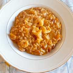 Foto di Risotto con zucca rossa, gamberi e pomodori secchi