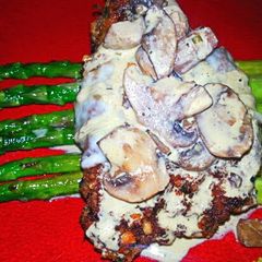 A picture of Walnut Crusted Chicken with Mustard Mushroom Creme Sauce.
