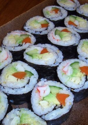 A picture of Japanese-Western Fusion Fat California Rolls with Kombu Seaweed.