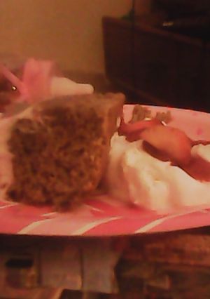 A picture of Strawberry banana cake with honey whipped topping.