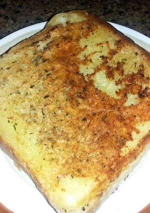 A picture of Oh so tasty parmesan cheese toast.