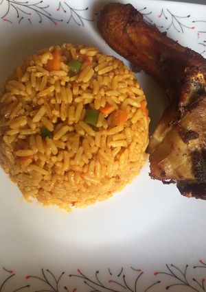 A picture of Party jollof rice and fried chicken.