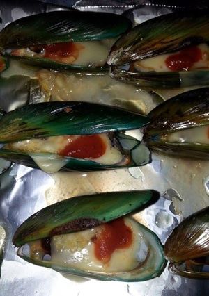 A picture of cheesy mussels.
