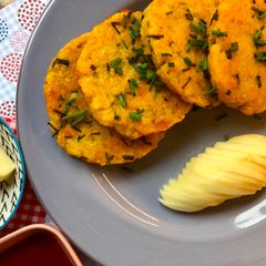 A picture of Baked Potatoes with Parmesan Cheese.