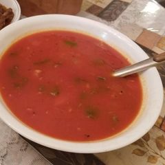 A picture of Red vegi Manchurian sauce.