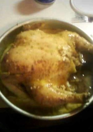 A picture of broccoli and rice stuffed chicken.