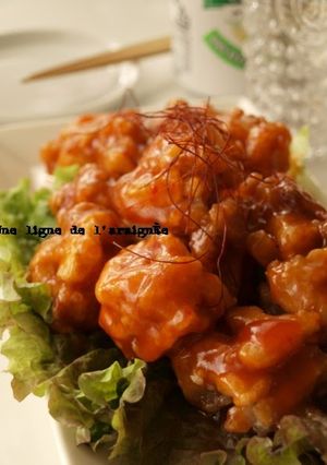 A picture of Light and Crunchy Pork and Lotus Root Fritters with Spicy Sweet-and-Sour Sauce.