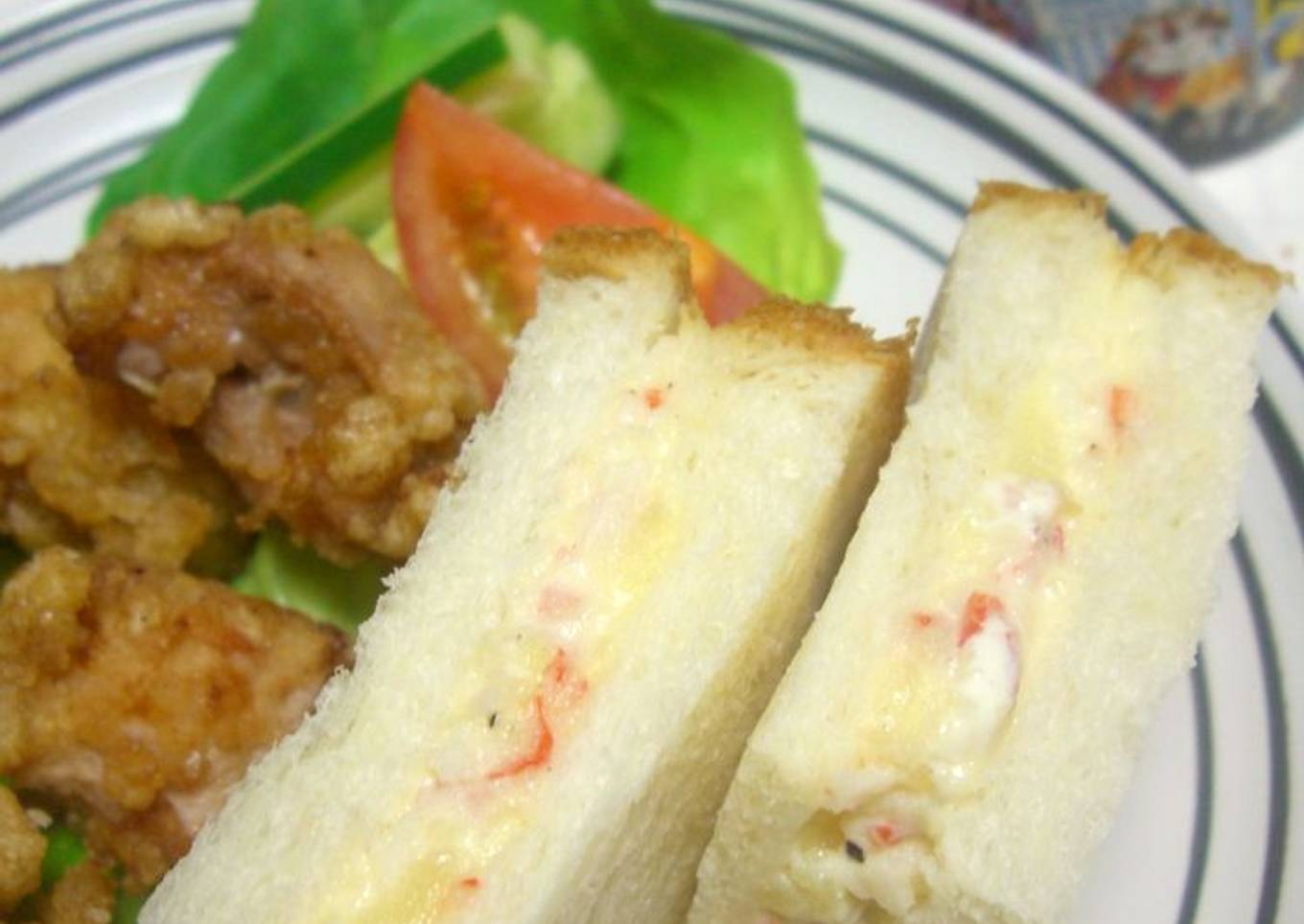 Sandwiches with crab sticks and potato salad