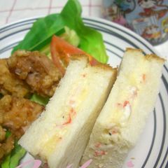 A picture of Crab Sticks and Potato Salad Sandwich.