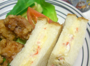 A picture of Crab Sticks and Potato Salad Sandwich.