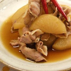 A picture of My Mother's Staple Simmered Pork Belly and Daikon Radish.