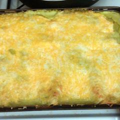 A picture of green chicken enchiladas.