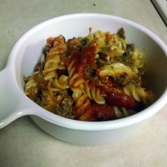 A picture of Baked rotini with meat sauce.