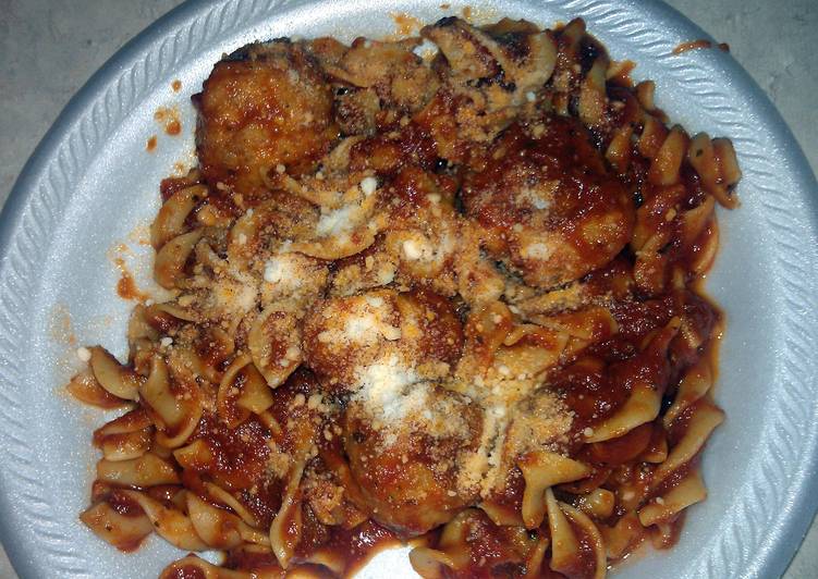 egg noodles with sauce and chicken meatballs