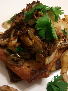 A picture of Sardines on fried toast.