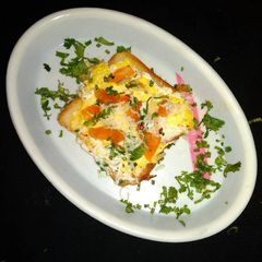 A picture of Bread cheese omlet.