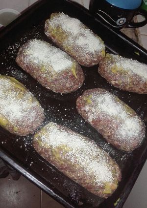 Una foto de Pan de carne individual rellenos.