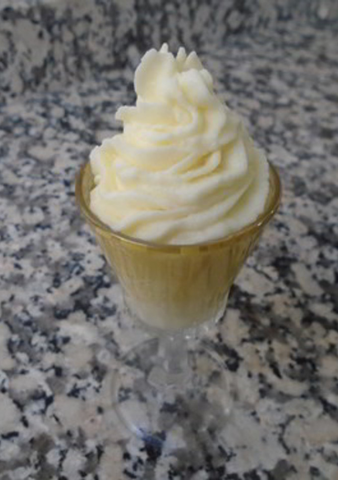 Una foto de Nata montada con aroma de cítricos