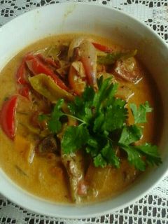 Una foto de Pollo en salsa de queso