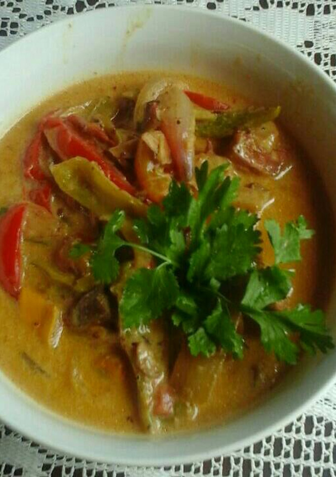 Una foto de Pollo en salsa de queso