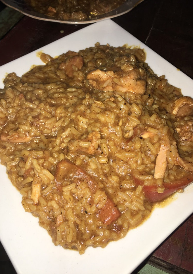 Una foto de Asopao de pollo y chuleta ahumada