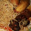 Palm oil spaghetti with unfried plantain and beef