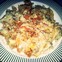 A picture of chicken with scrambled eggs.