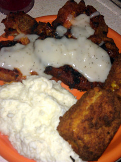 A picture of fried corn on the cob.