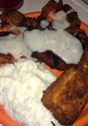 A picture of fried corn on the cob.