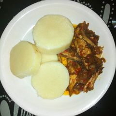 A picture of Boiled yam with fish sauce.
