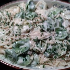 A picture of Fettuccine and cheese tortellini pasta.