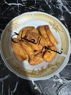 صورة لوصفة بطاطس مسلوقه ومحمره