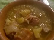 Una foto de cazuela de rabo