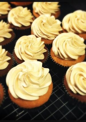A picture of White Chocolate Cupcake with Peanut Butter frosting.