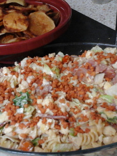 A picture of My BLT Pasta Salad (Bacon, Lettuce & Tomato) with Potato Crisps.