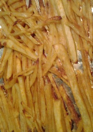 A picture of oven potatoe sticks.
