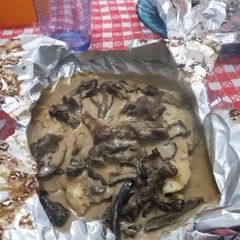 A picture of Filet of Fish Papillote with Pine Mushroom Sauce.