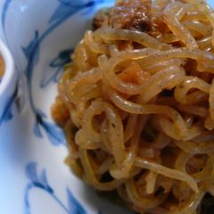 A picture of Shirataki Noodles Boiled with Pickled Plums and Bonito Flakes.