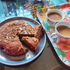 A picture of Eggless Banana Walnut Almond Cake.
