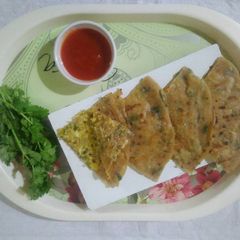 A picture of Cheesy corn Paratha.